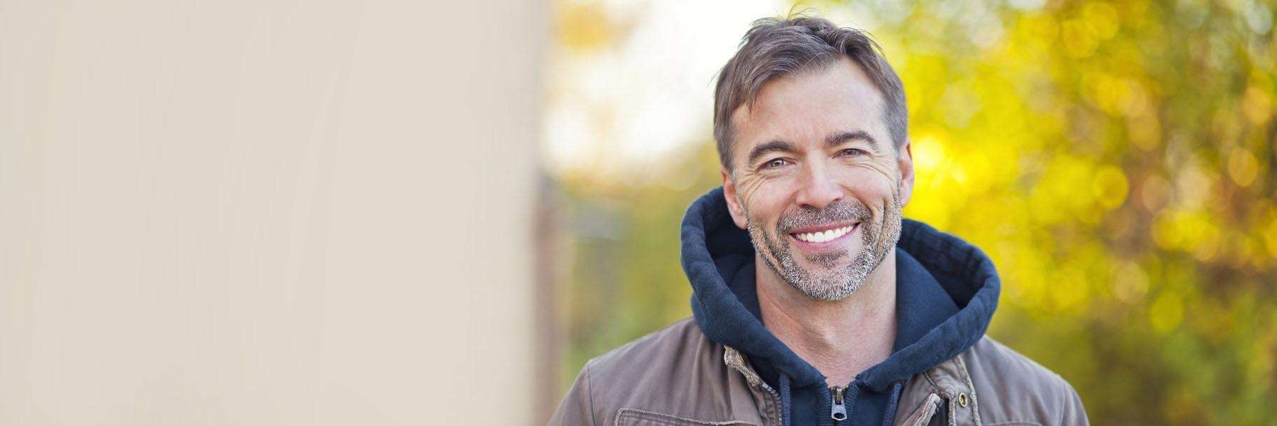 A man smiling | dental implants st augustine