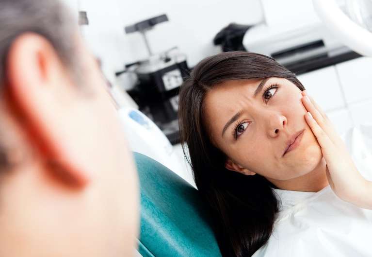 A woman getting TMJ Solutions in St. Augustine, FL