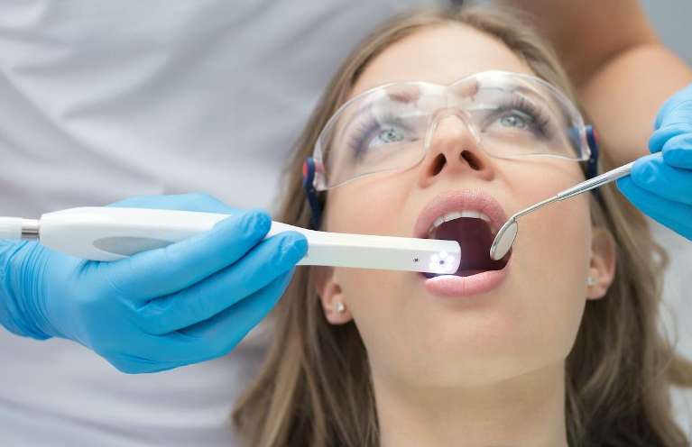 A woman getting same day dental crowns