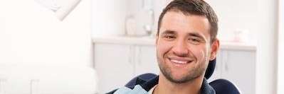 A man sitting in the dentist's office | dental hygiene month