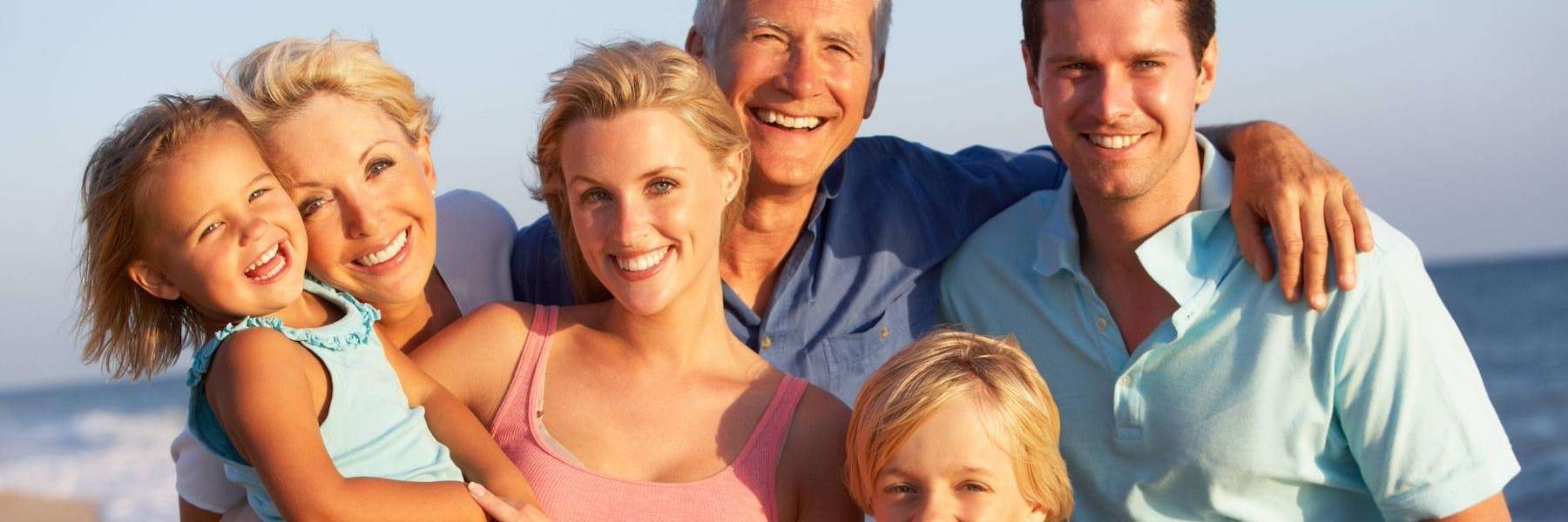 A family smiling after a dental treatment in St. Augustine