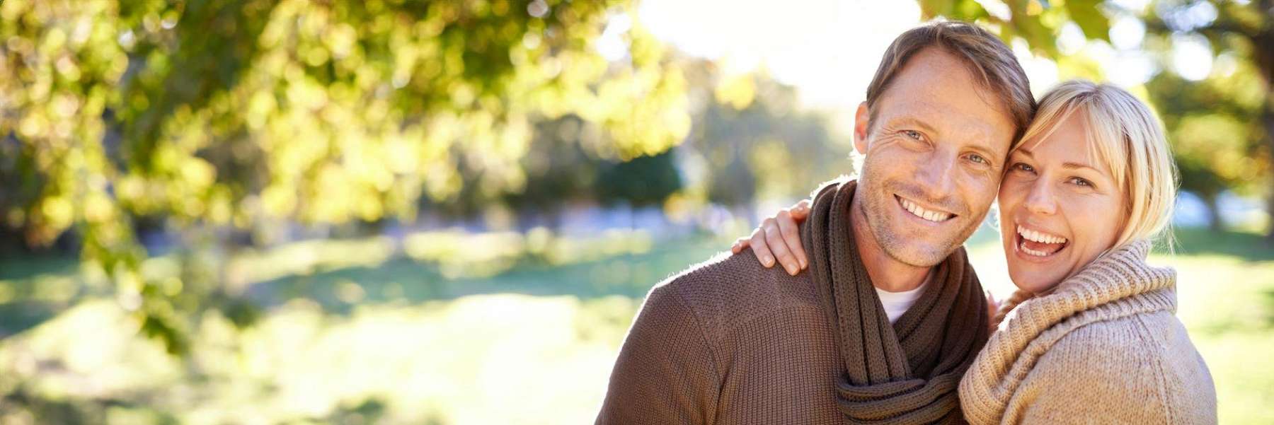 A smiling couple in the park